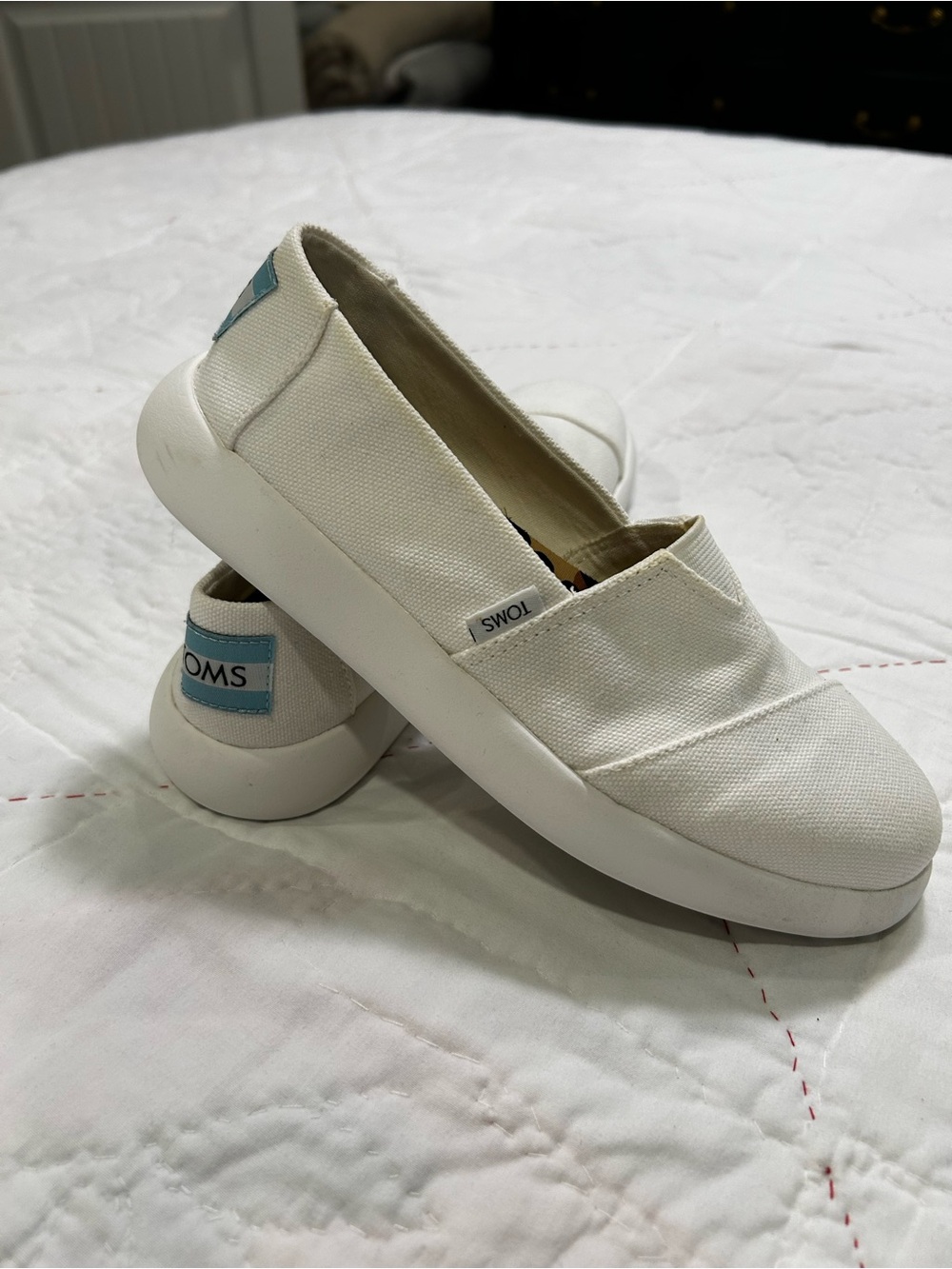 Toms White Canvas Slip-On Flats with Light Blue Heel Tab